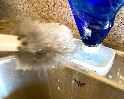 SoapDish - Gravity Fed Liquid Soap Dispenser (in white).