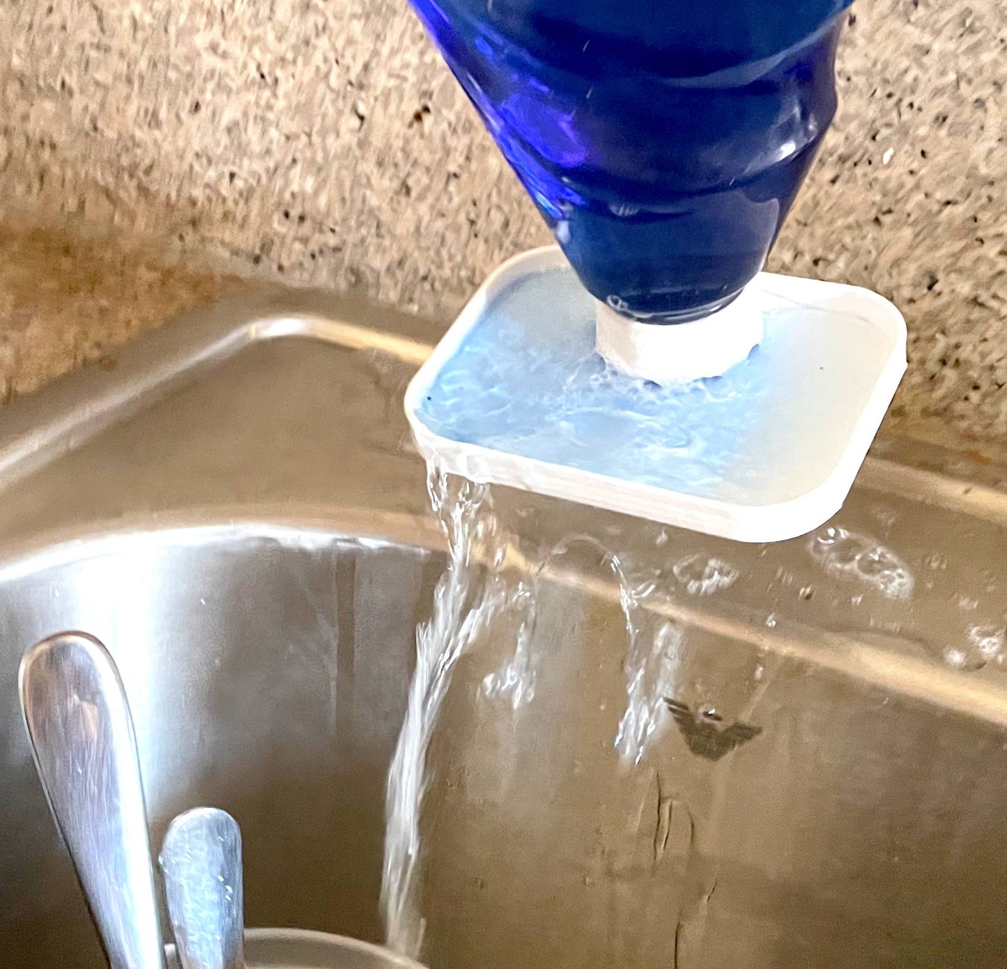 SoapDish - Gravity Fed Liquid Soap Dispenser (in white).